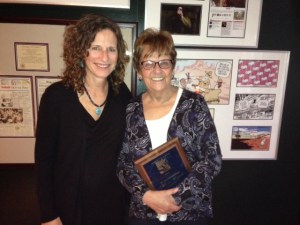 Leadville Herald Democrat editor Marcia Martinek, right, with her 2015 SPJ First Amendment Award and Ashley Kissinger.